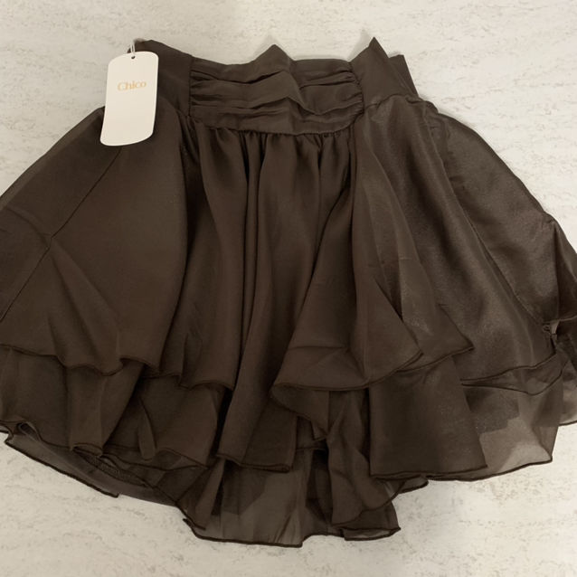 新品Chicoフリルティアードミニスカパン